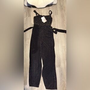 black and gold sparkle jumpsuit